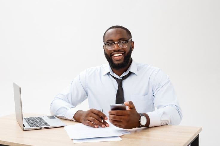 A business owner celebrating growth with WiSabi